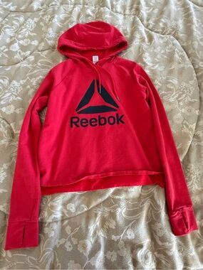 Red women’s Reebok hoodie